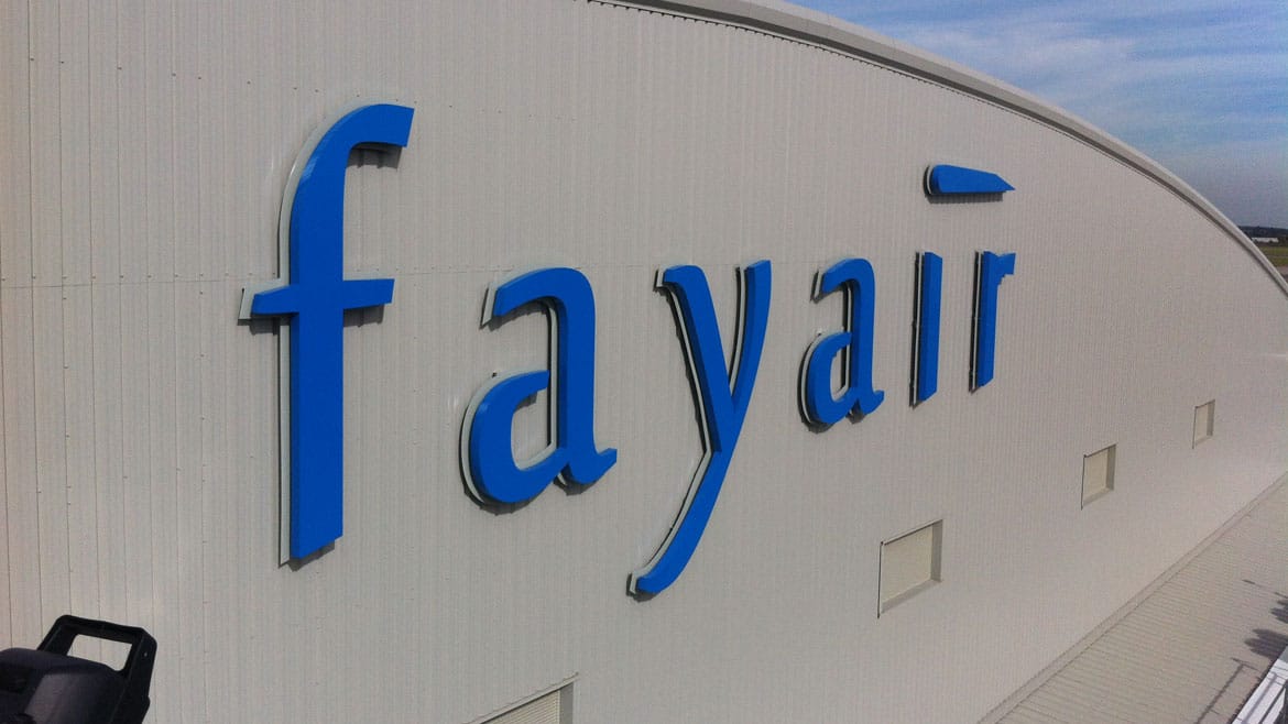 Aviation industry - Fayair aircraft hangar signage at Stansted airport